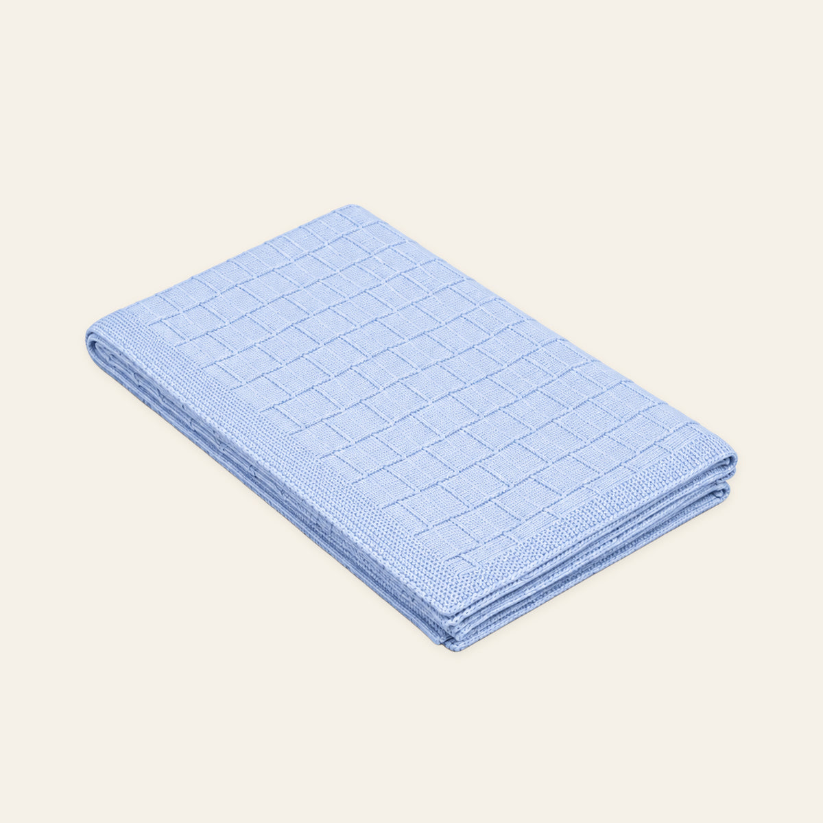 Pislak Buba Baby Knitted Blanket in light blue, folded with a fine checked knit pattern.
