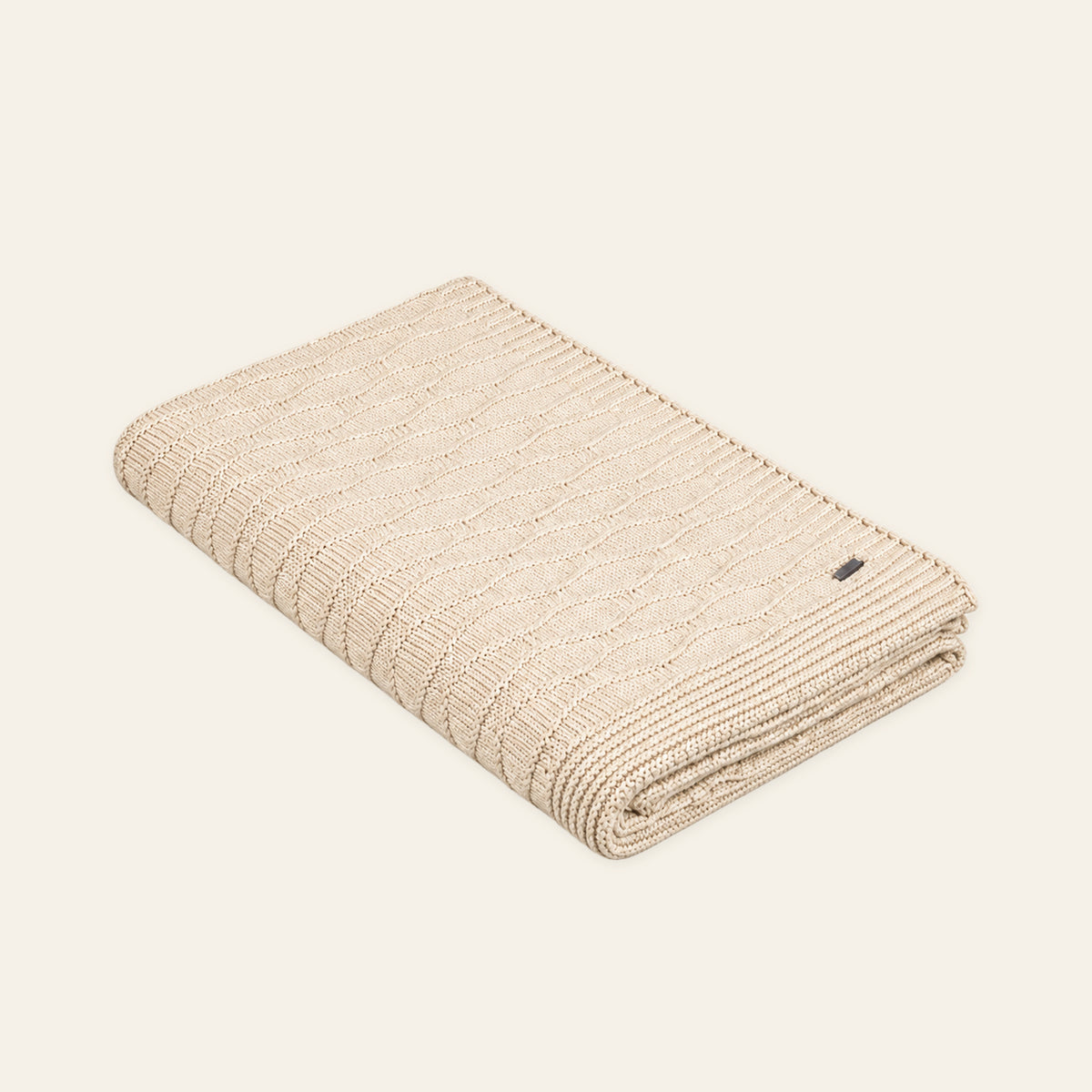 Soča knitted blanket in Beige, studio view