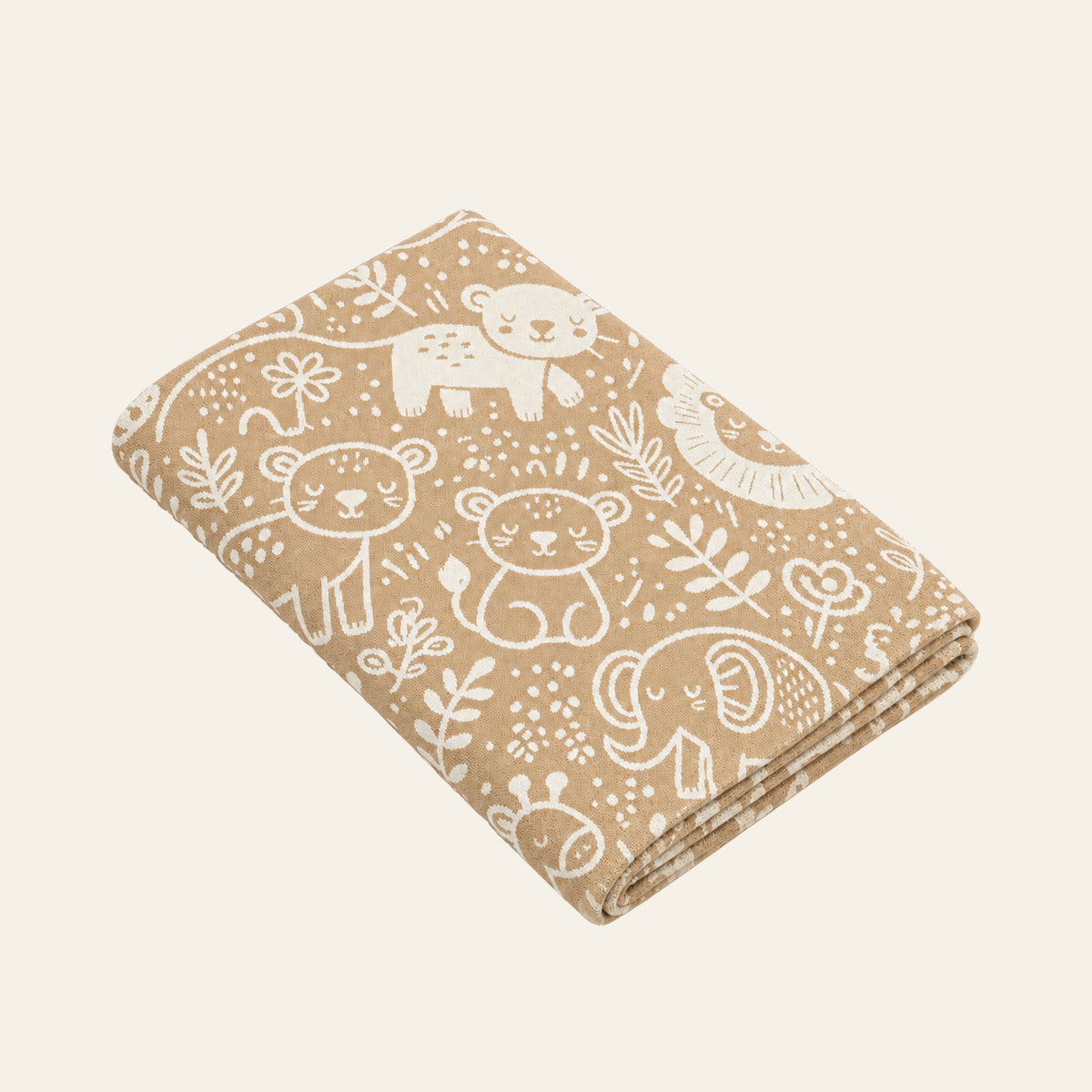 Svit cotton children’s blanket in sand and cream, neatly folded in a studio view showing the animal motifs and thin knitted layers.