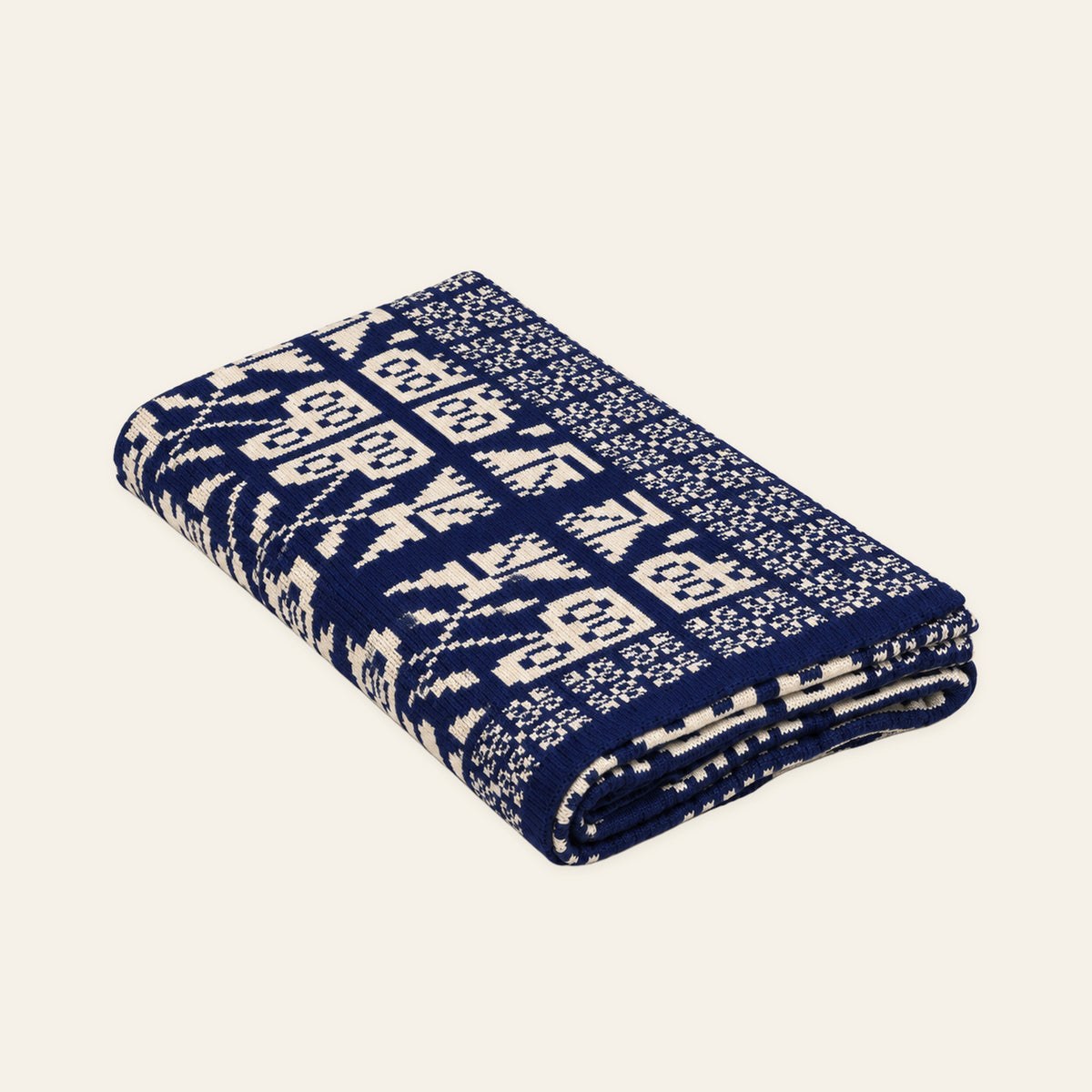 Velika Planina knitted blanket in Blue / Cream, studio view