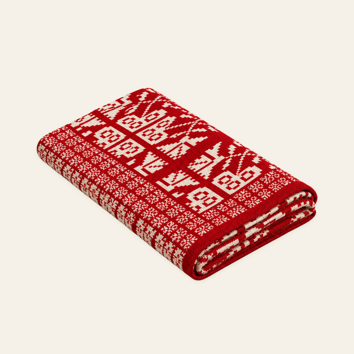 Velika Planina knitted blanket in Red / Cream, studio view