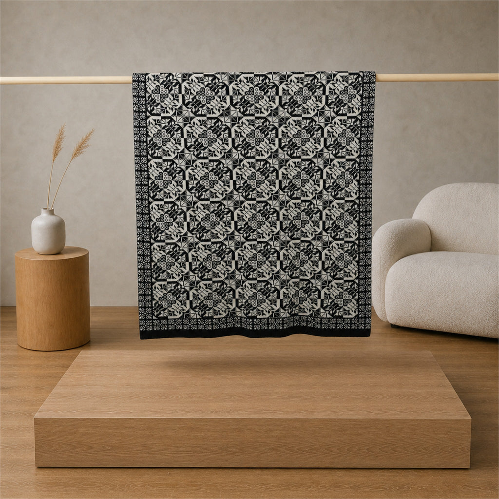 Mala Planina knitted blanket in Black / Cream, full pattern view
