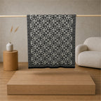 Mala Planina knitted blanket in Black / Cream, full pattern view