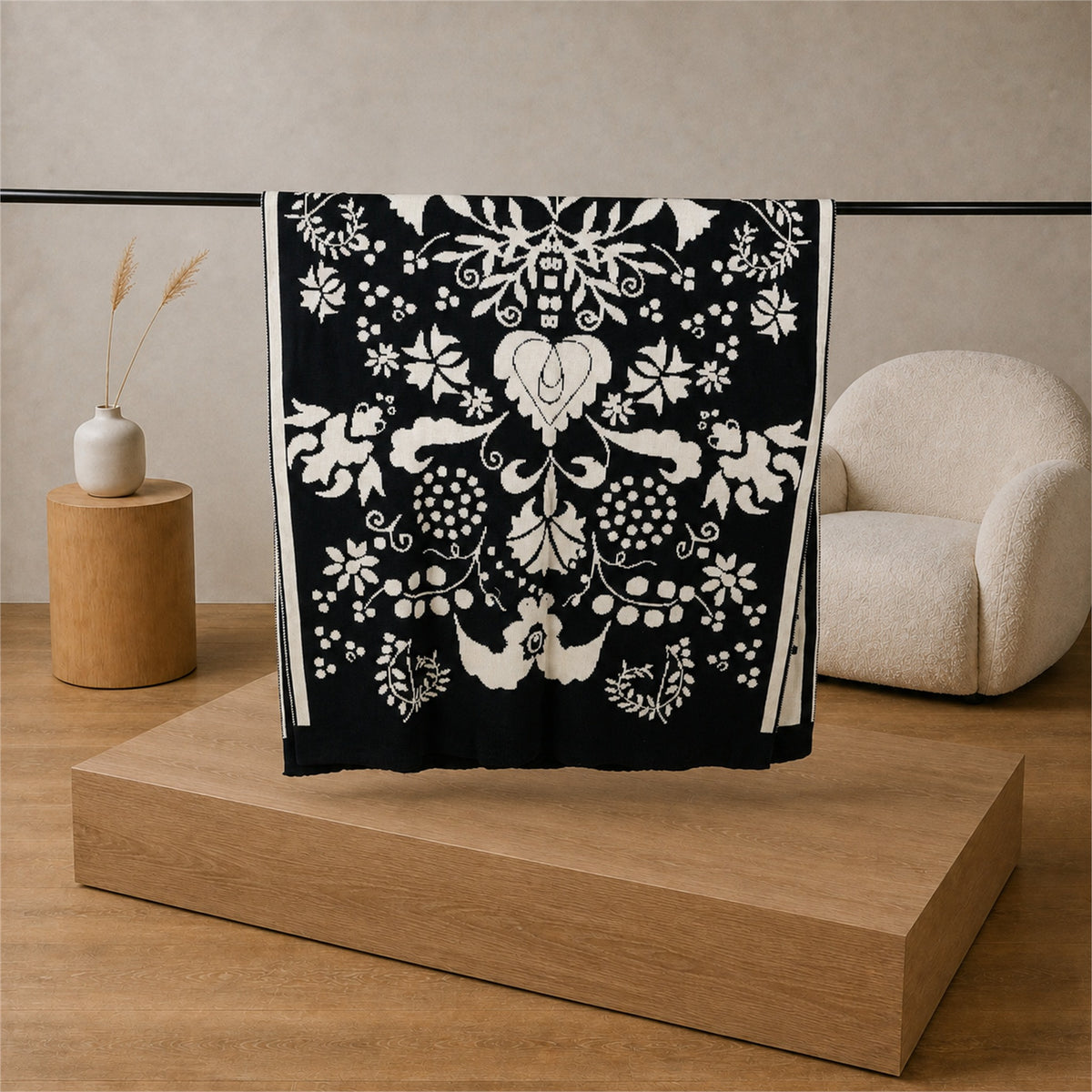 Carnation knitted blanket in Black / Cream, full pattern view