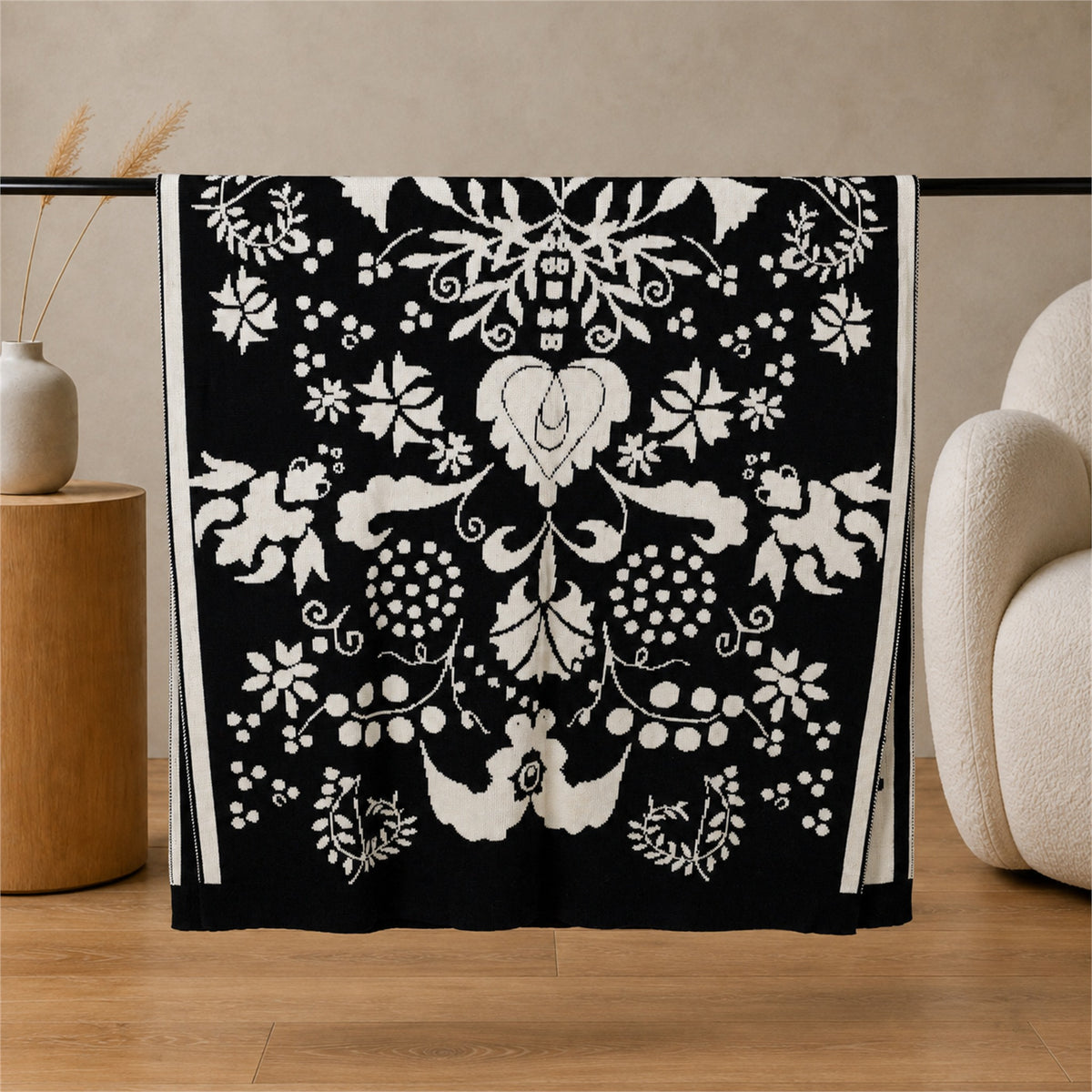 Carnation knitted blanket in Black / Cream, pattern and texture detail