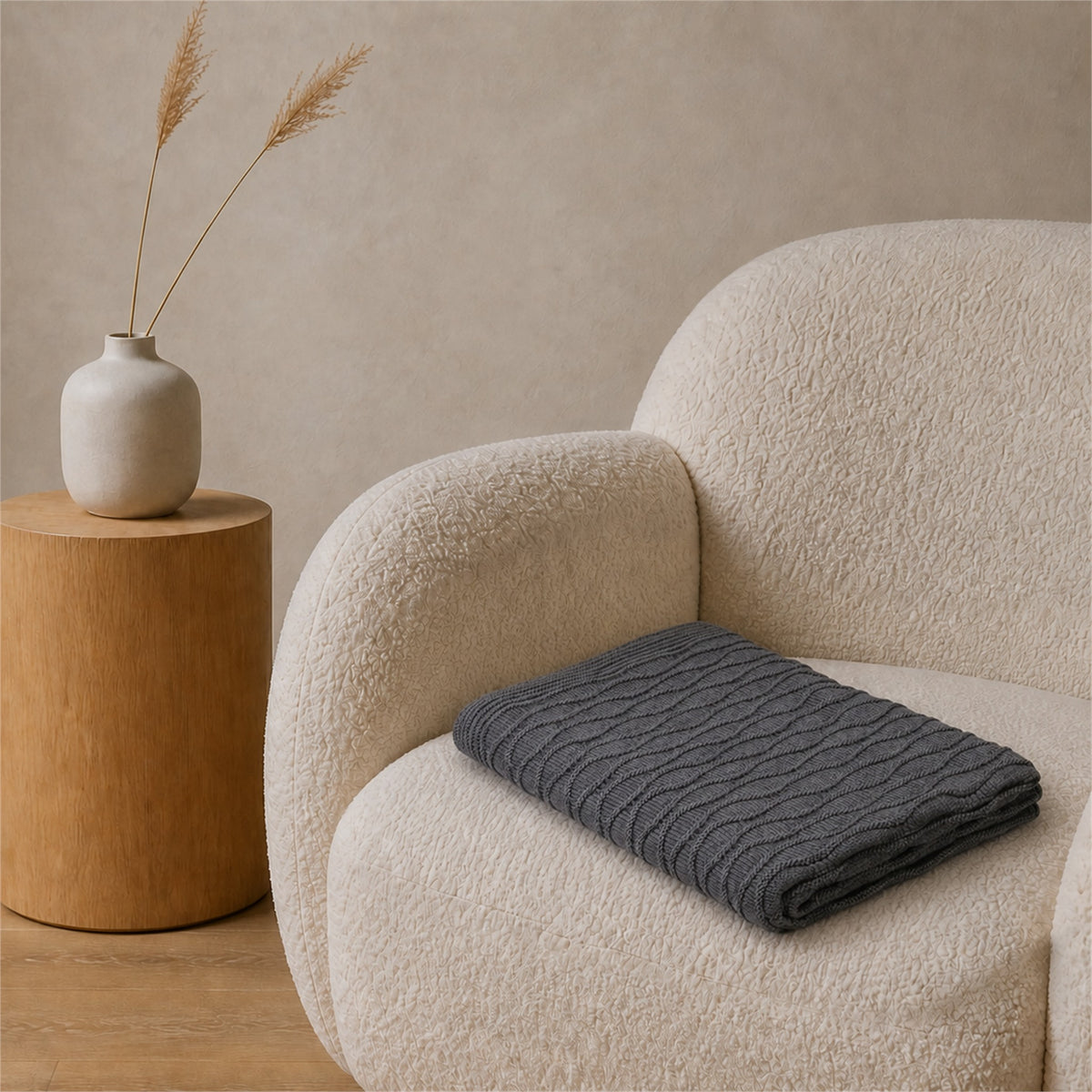 Soča knitted blanket in Grey, folded view