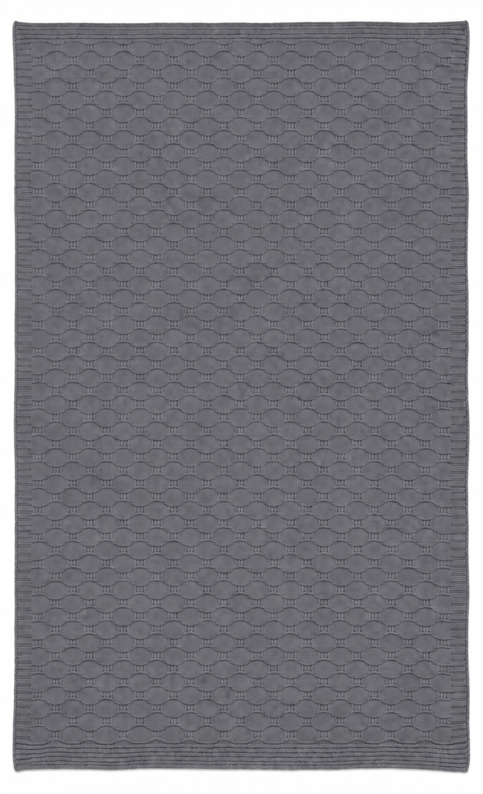 Soča knitted throw in grey, fully unfolded studio view showing the fine repeating wave pattern and knitted edges.