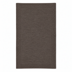Tinka throw in taupe, shown fully unfolded with a fine knitted centre and a broad textured border.