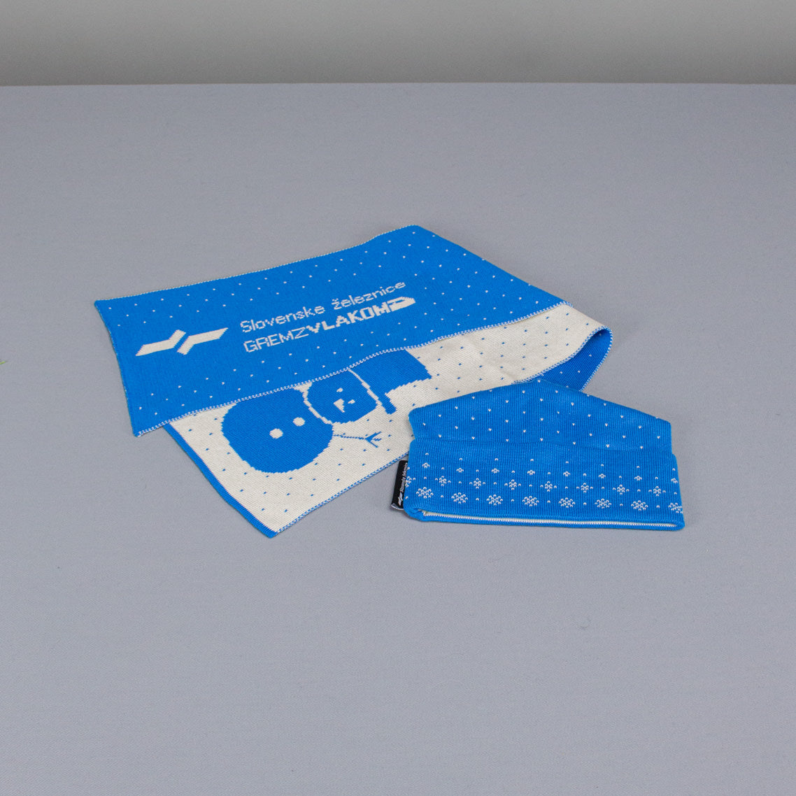 Promocijski šali in kompleti — primer dosedanje izvedbe 7