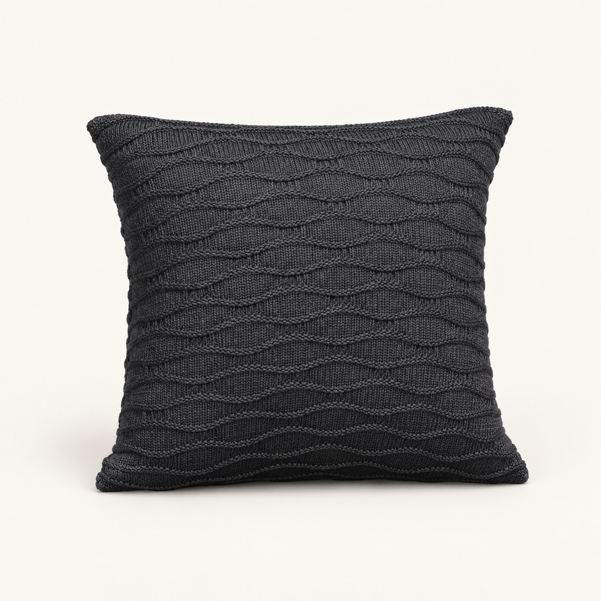 Soča knitted cushion cover in anthracite, front studio view