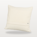 Tinka textured knitted cushion cover in cream, front studio view